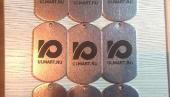 Лазерная гравировка на номерки